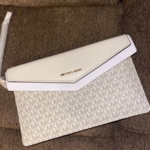Brand new michael Kors clutch/ oversized wristlet